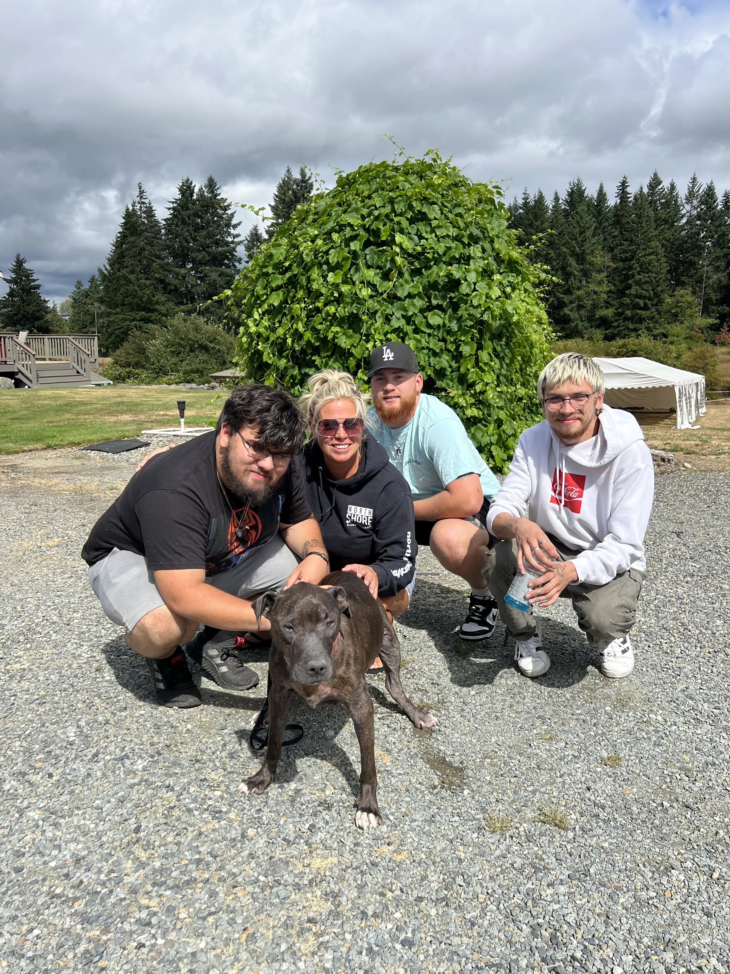 Bettina Gese with her three sons and the family dog